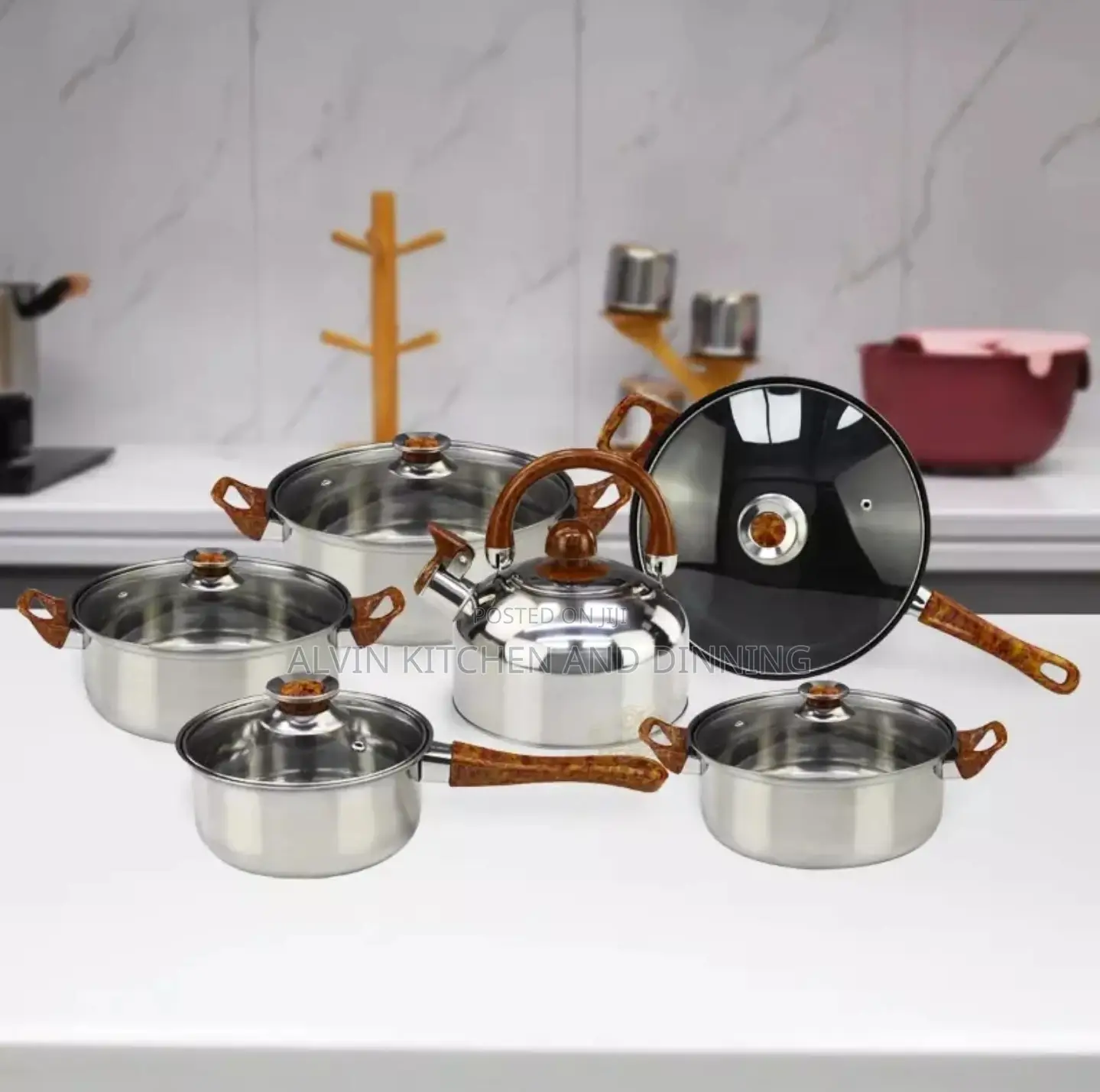 Stainless Steel Non-Stick Cookware Set
 a Whistling Kettle