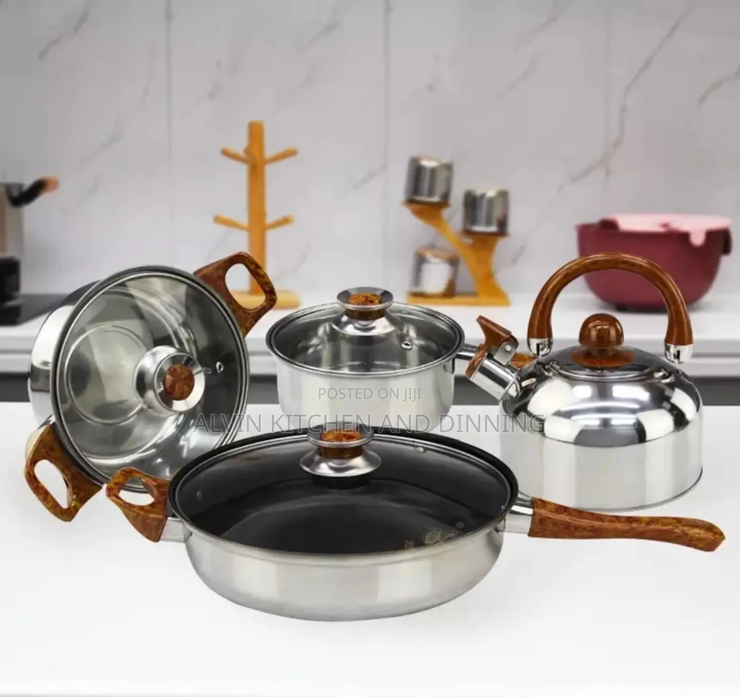 Stainless Steel Non-Stick Cookware Set
 a Whistling Kettle