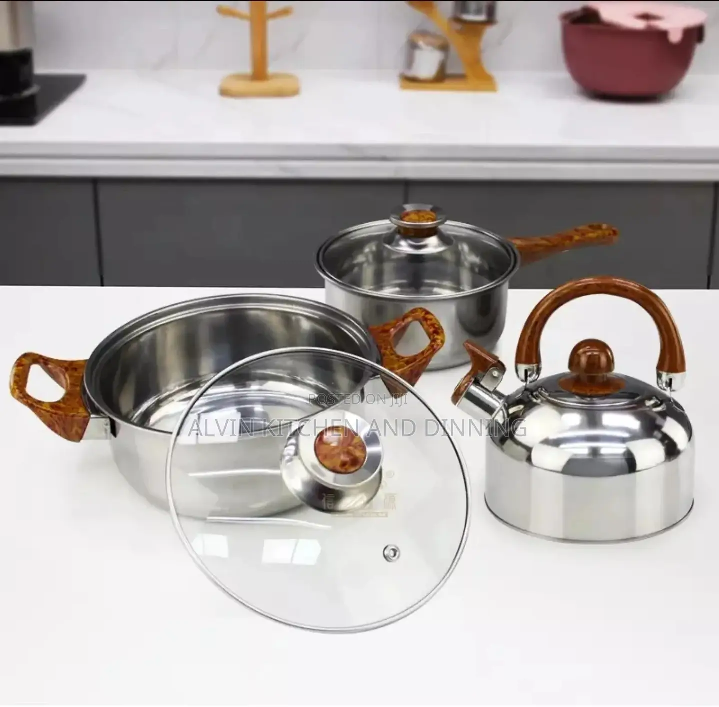 Stainless Steel Non-Stick Cookware Set
 a Whistling Kettle