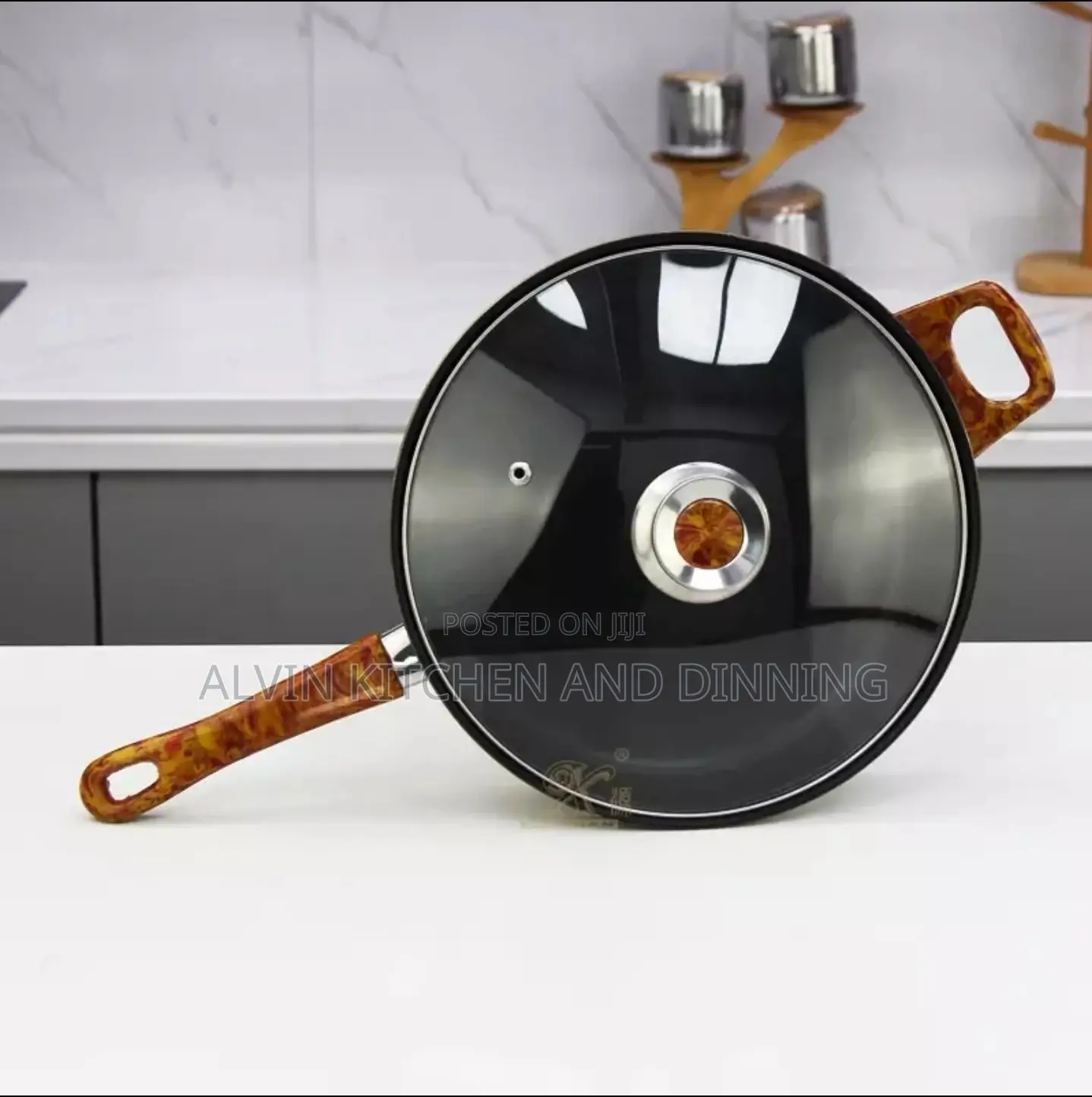 Stainless Steel Non-Stick Cookware Set
 a Whistling Kettle