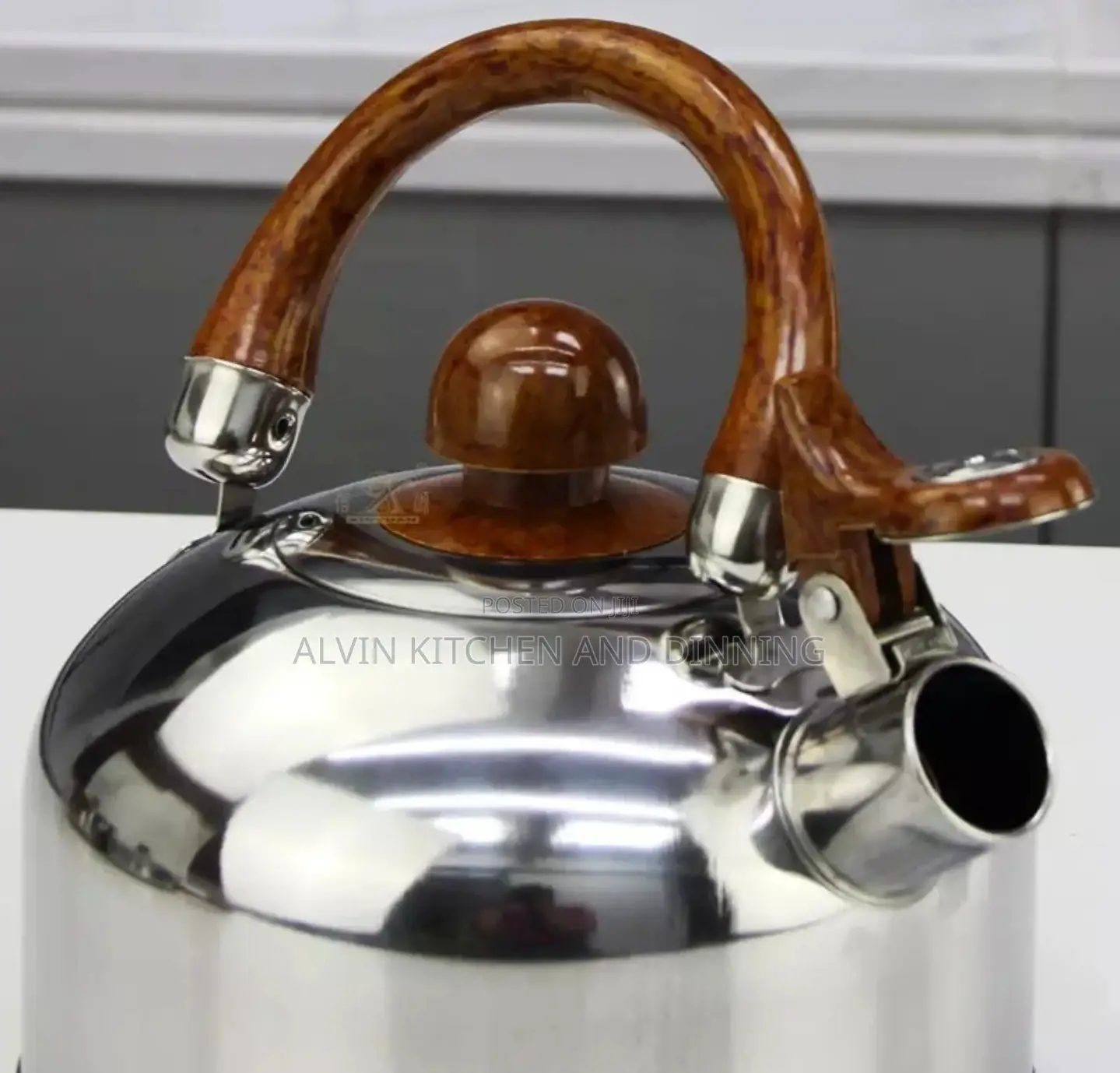 Stainless Steel Non-Stick Cookware Set
 a Whistling Kettle
