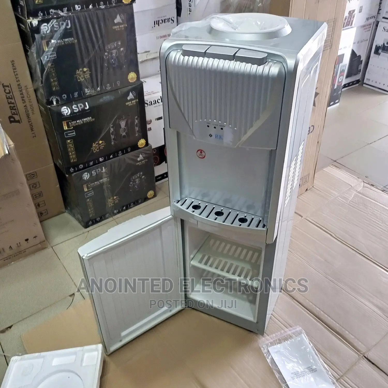Water Dispenser With A Fridge Down