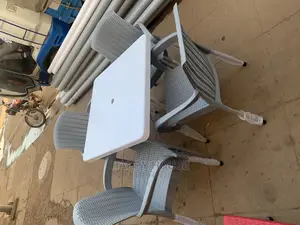 Set of Tables and 4 Chairs