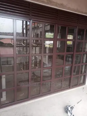 Chocolate French Aluminum Sliding Door Available.