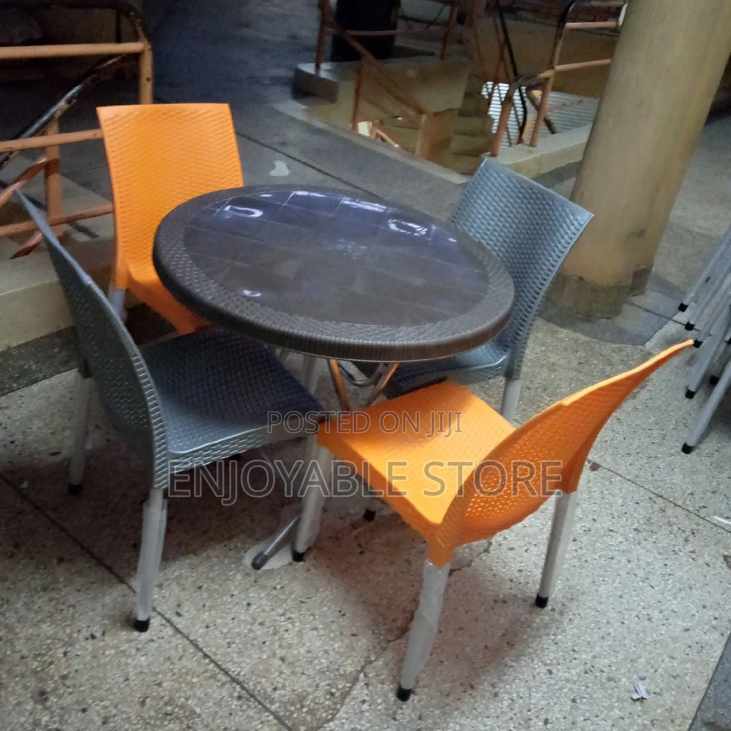 Plastic Set of Foldable Round Table and 4 Unique Chairs
