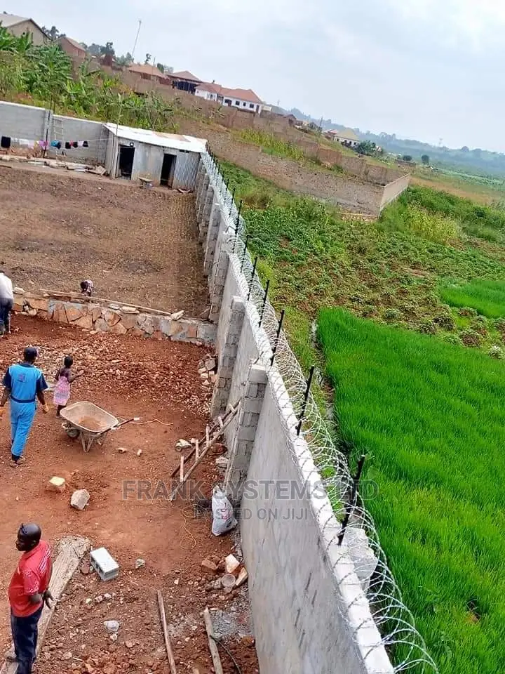 Electric Fence System With Razor Wire. Two In One