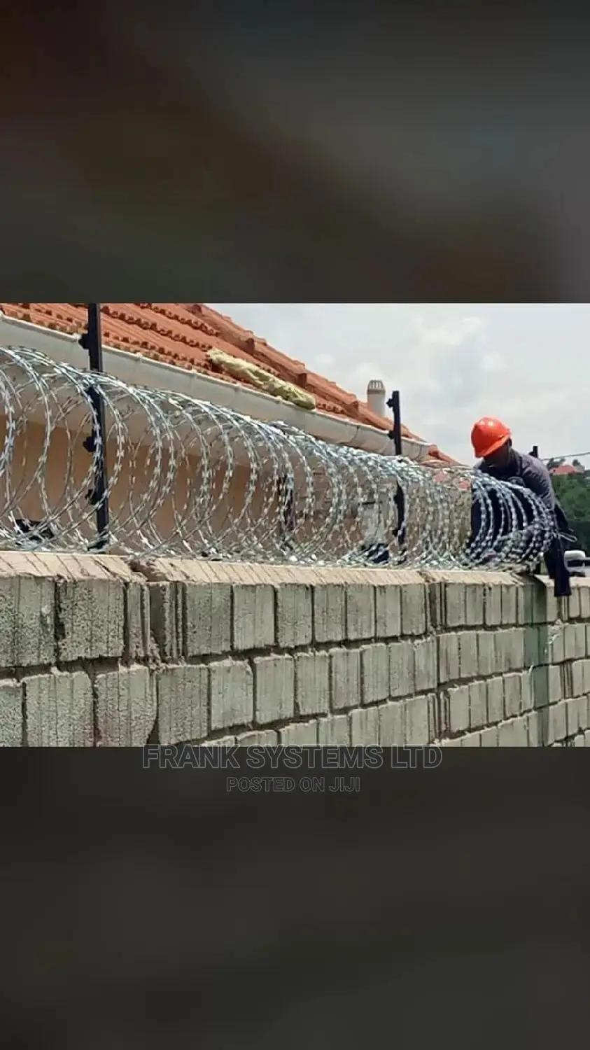 Electric Fence System With Razor Wire. Two In One