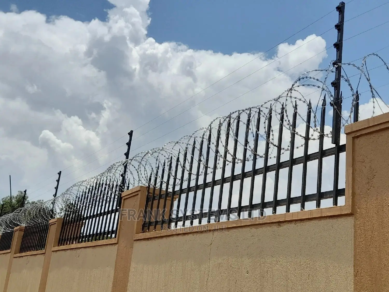 Electric Fence System With Razor Wire. Two In One