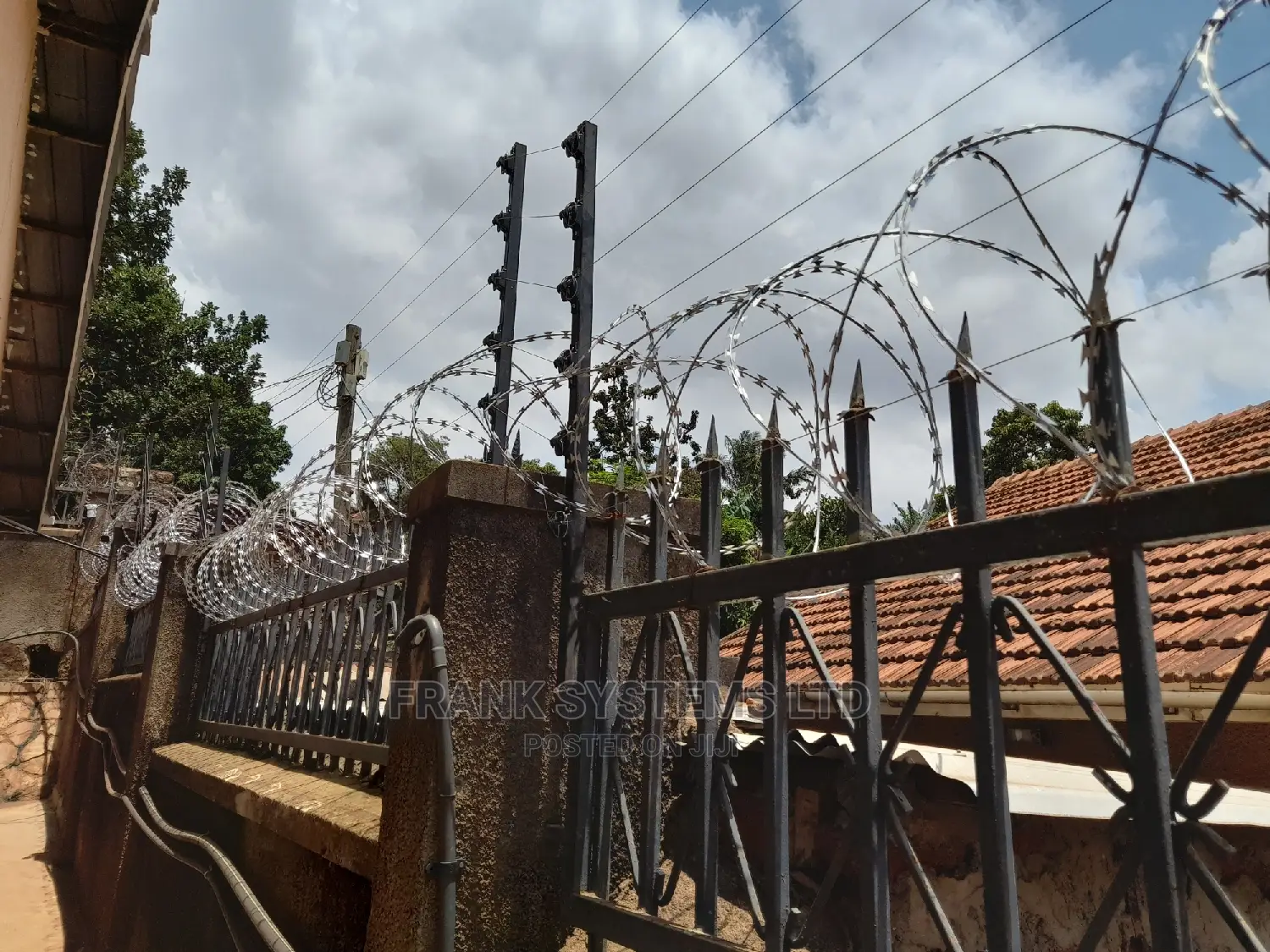 Electric Fencing System With Razor Wire.