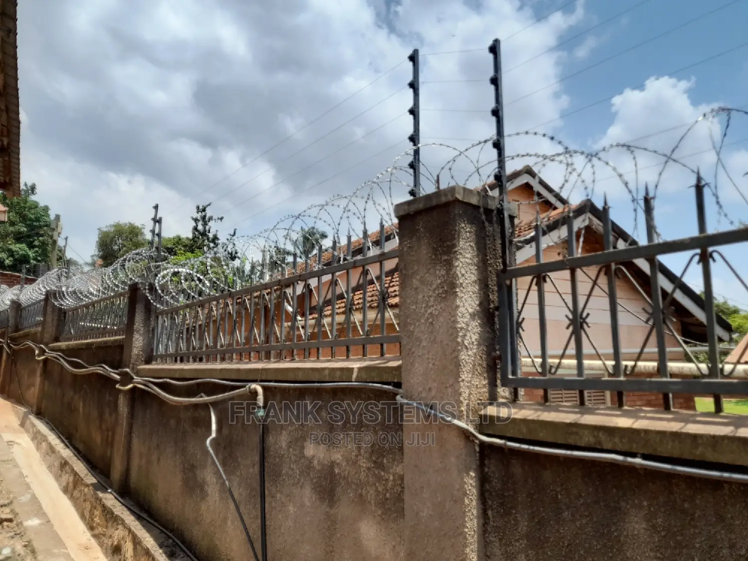 Electric Fencing System With Razor Wire.
