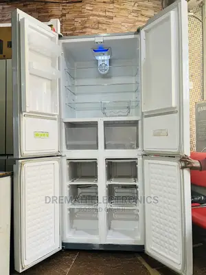 Photo - 710 Samsung French Door Side by Side Frost Free Fridge