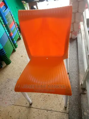Mukwano Designed Chair, With Matallic Legs Orange Colour