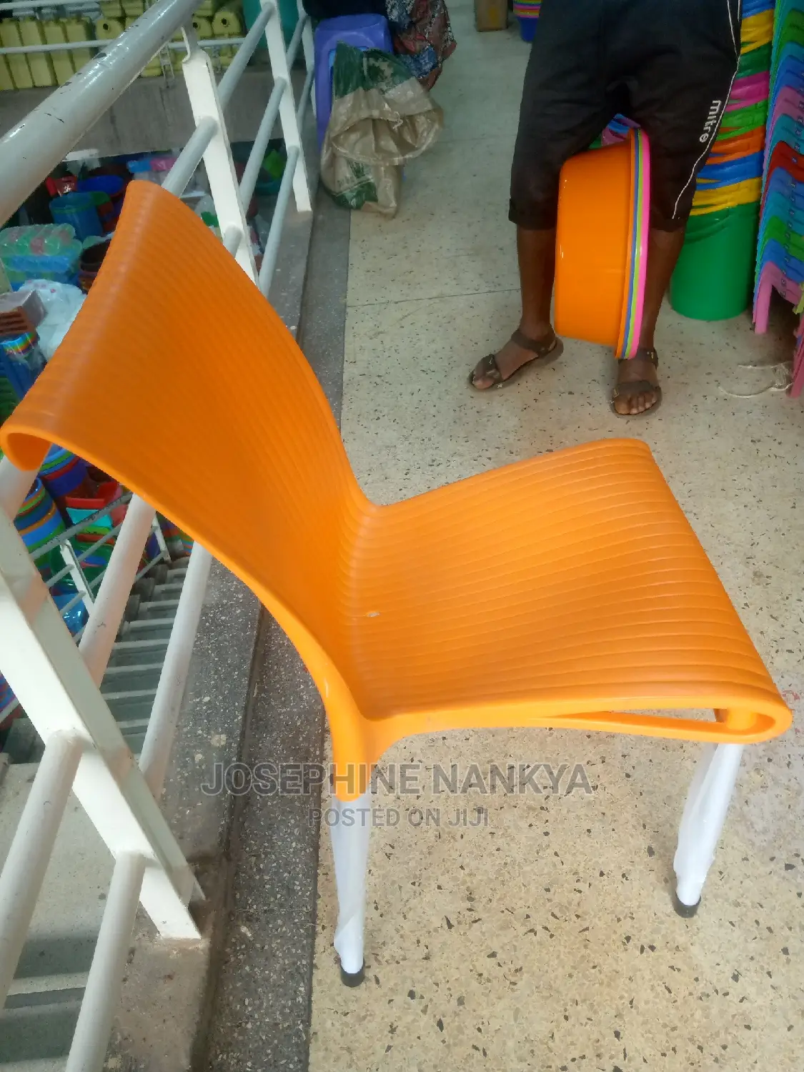 Mukwano Designed Chair, With Matallic Legs Orange Colour