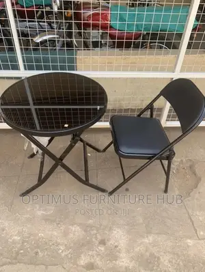 Glass Table With a Foldable Chair