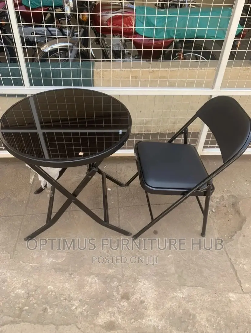 Glass Table With a Foldable Chair
