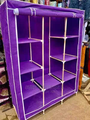Photo - 3 Columns Wooden Frame Wardrobe