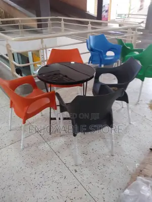 Plastic Set of Chairs and Glass Round Table