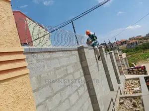 Electric Fence System With Razor Wire