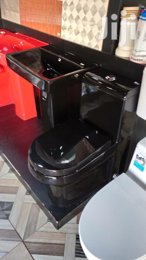 Black Toilet and Wash Hand Basins