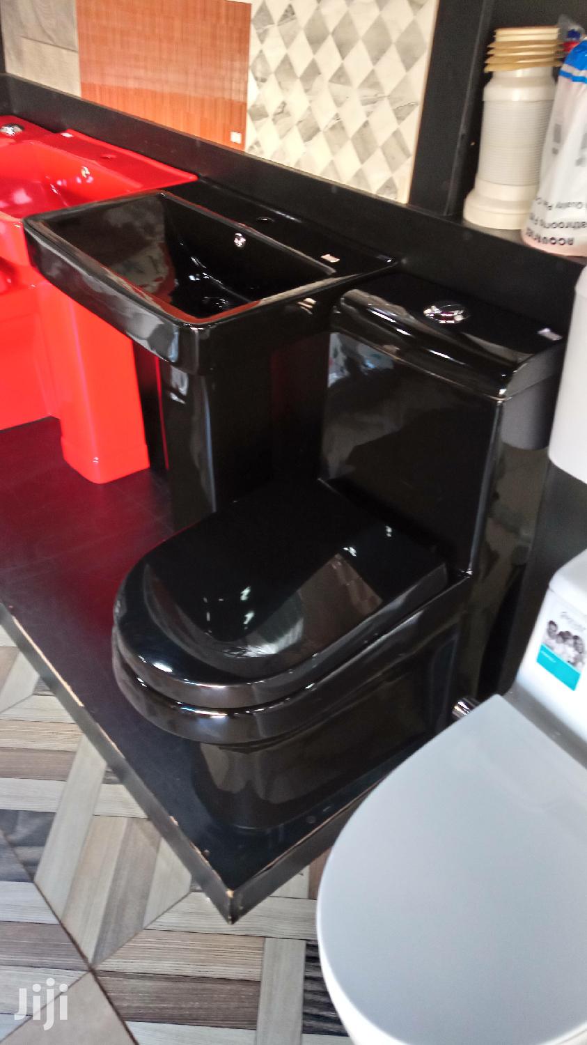 Black Toilet and Wash Hand Basins