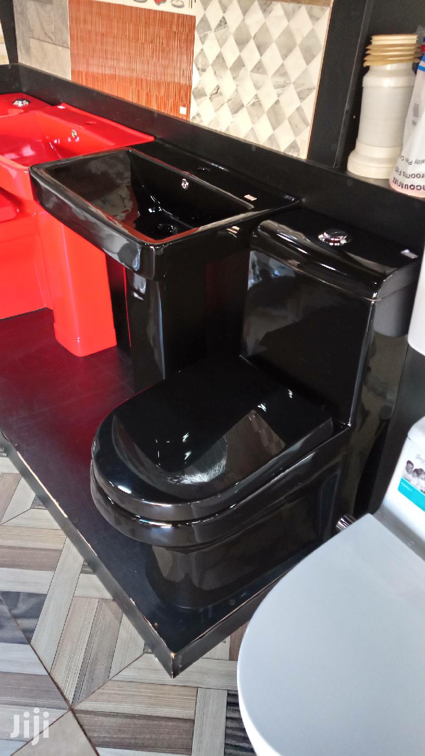 Black Toilet and Wash Hand Basins
