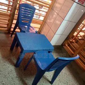 Plastic Strong Armless Chairs and Medium Table
