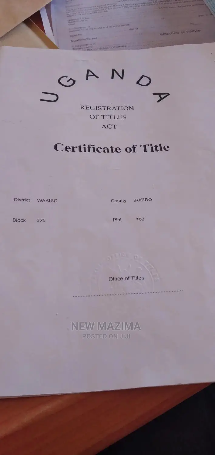 Two Private Mile Titled Plots Forced Sale in Heart of Buloba