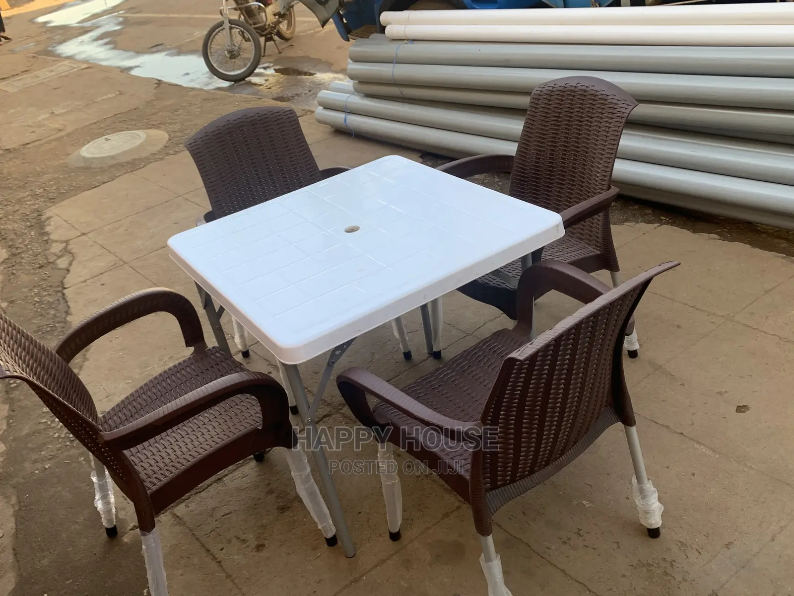 Set of Table and 4 Plastic Chairs