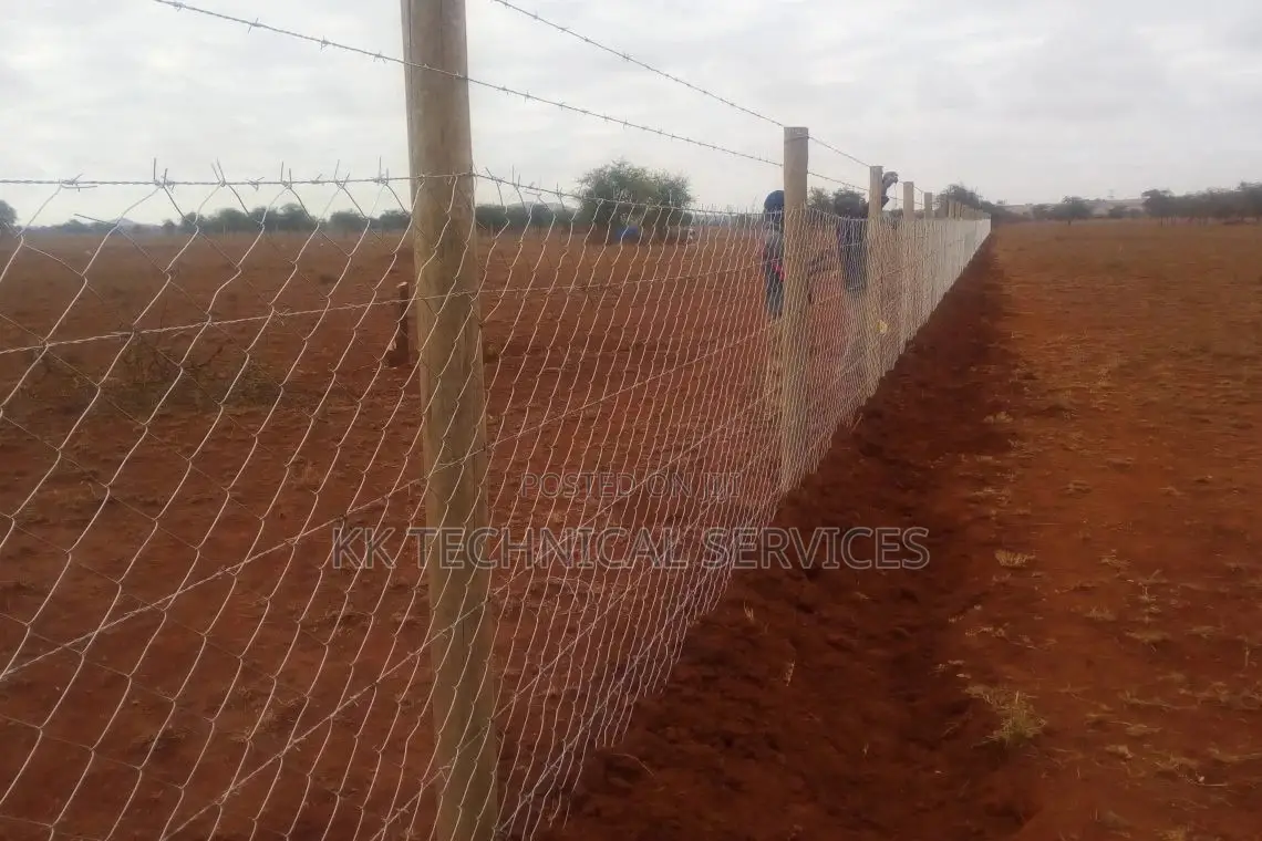 Chain Link Fencing on Wooden Poles