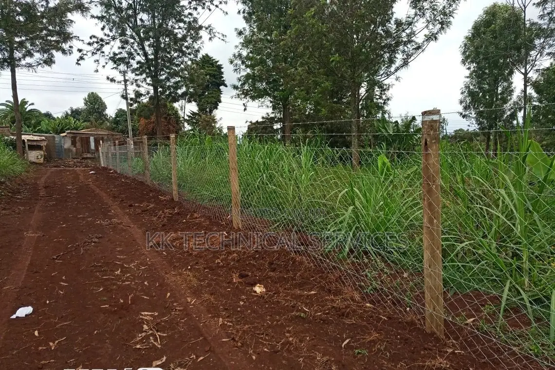 Chain Link Fencing on Wooden Poles