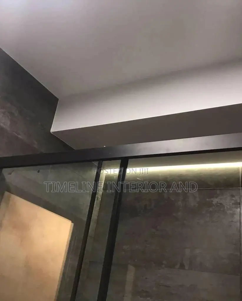 Simplistic Sitting Room Gypsum Ceilings.