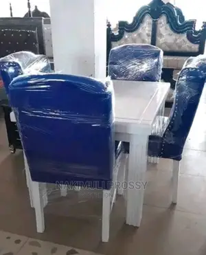 White and Blue Dressed Dinning Table
