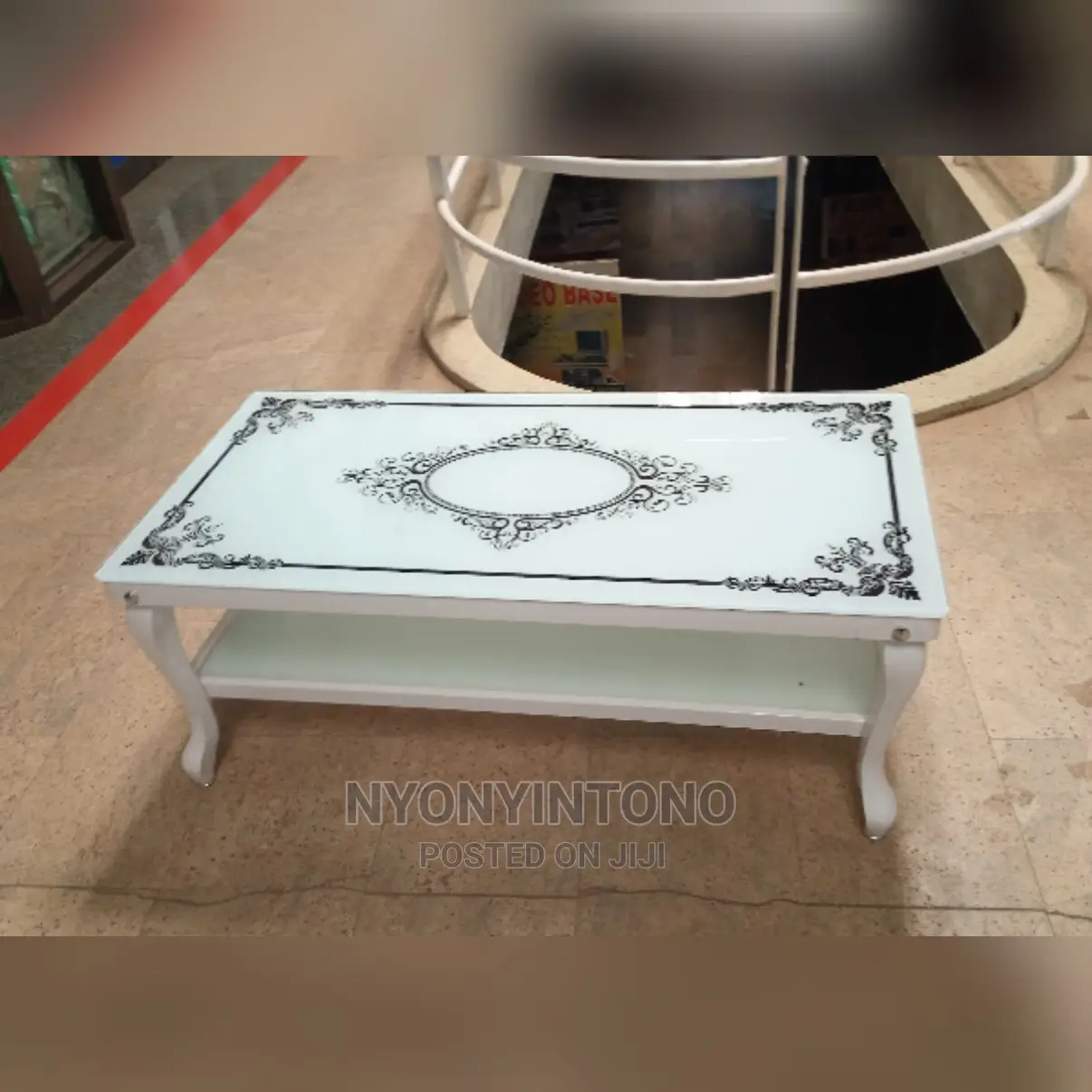 Glass Coffee Centre Table With Ametallic Frame