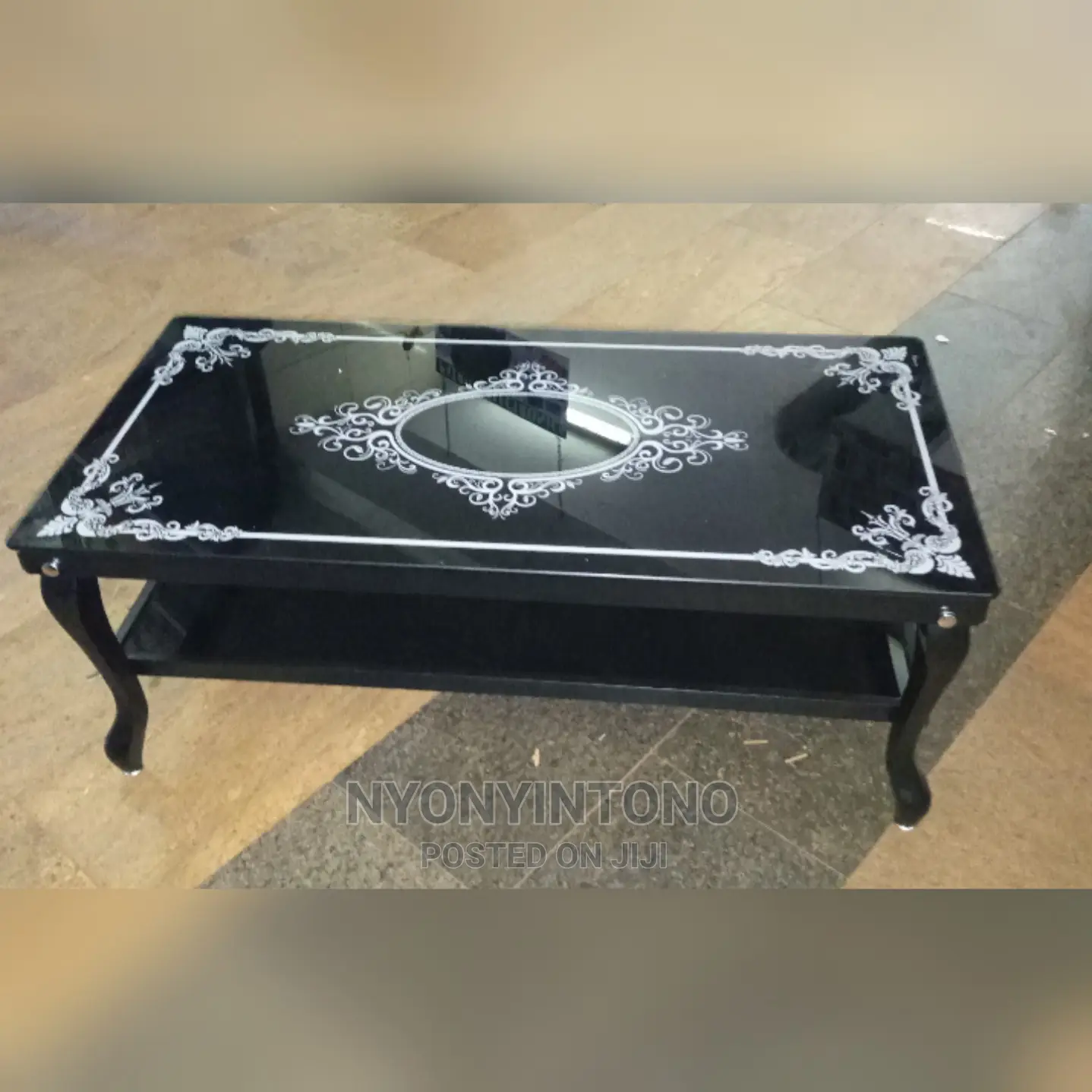 Glass Coffee Centre Table With Ametallic Frame