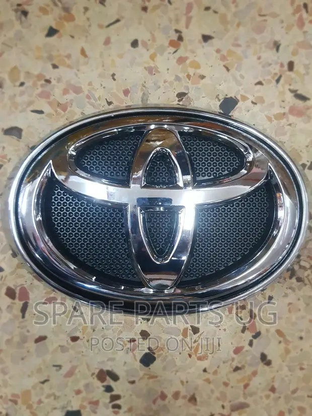 thumbnail interactive-video image 1 of Genuine Toyota Matt Black Front Emblem - 19cm For Hilux Revo Rocco (2015-2020) - Part #75310-0K010 1 of 5