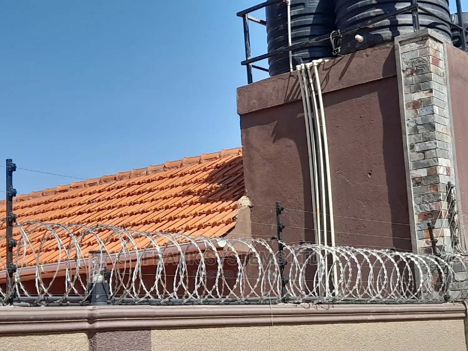 Electric Fence System With With Razor Wire