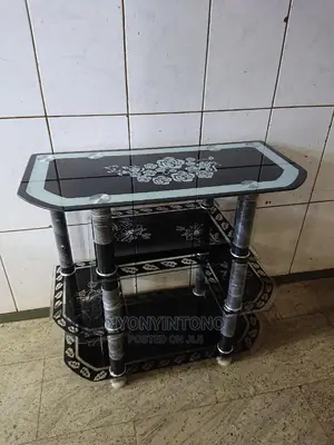 Glass Tv Stand With Ample Space for Woofers