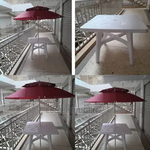 Photo - Umbrella And Table