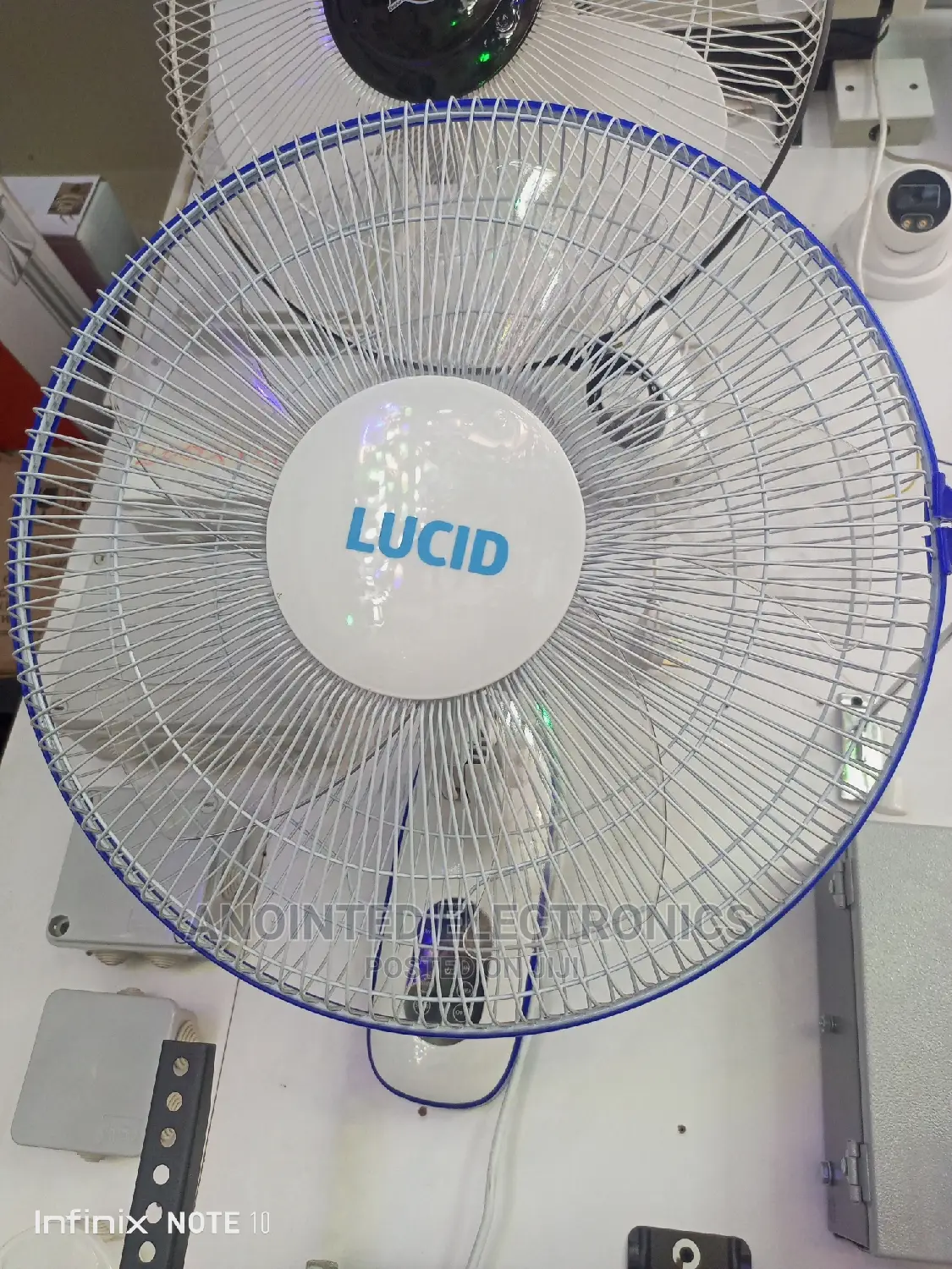 Lucid Wall Mounted Fan With a Remote