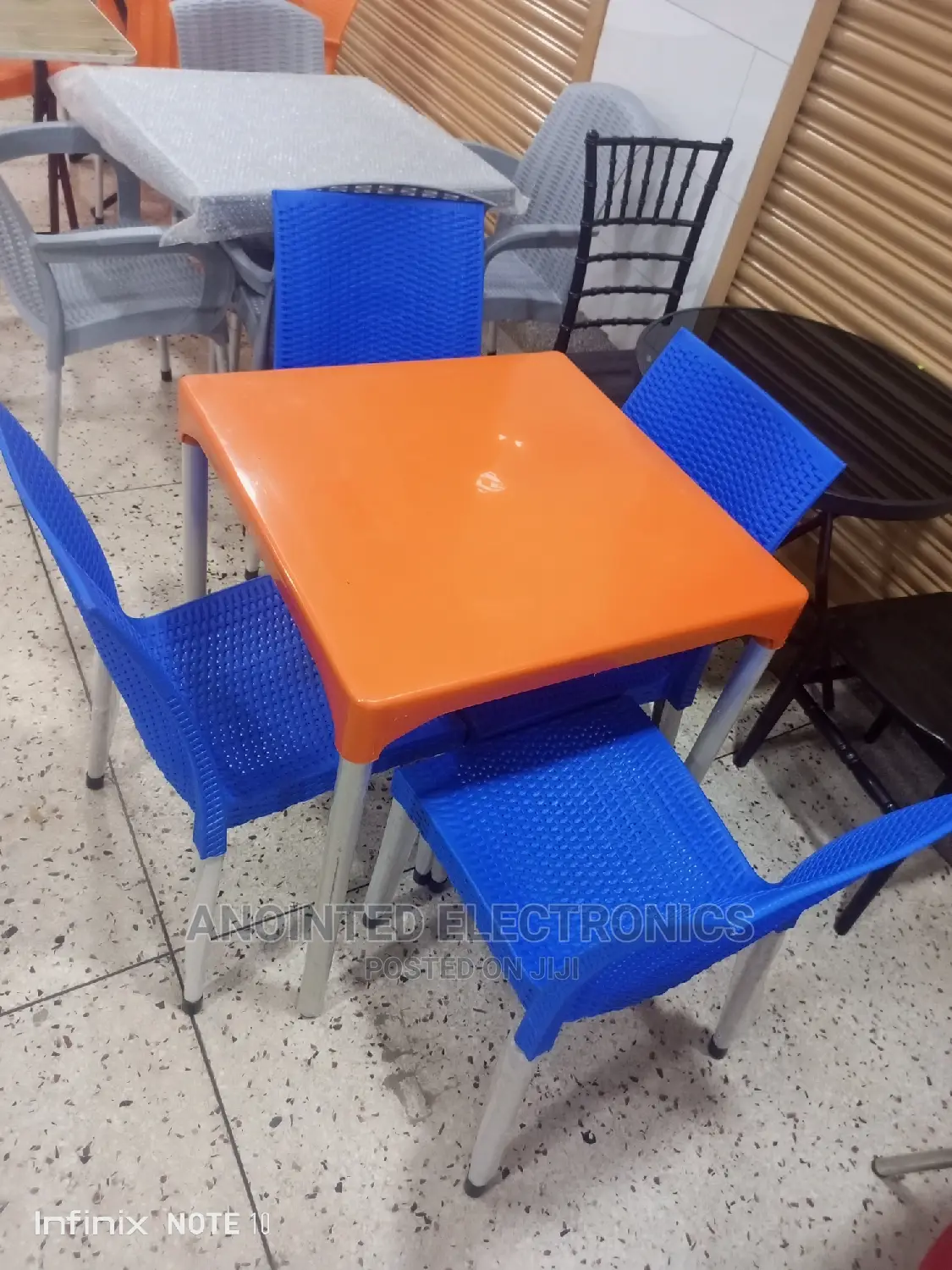 A Set of Dining Table and Chairs