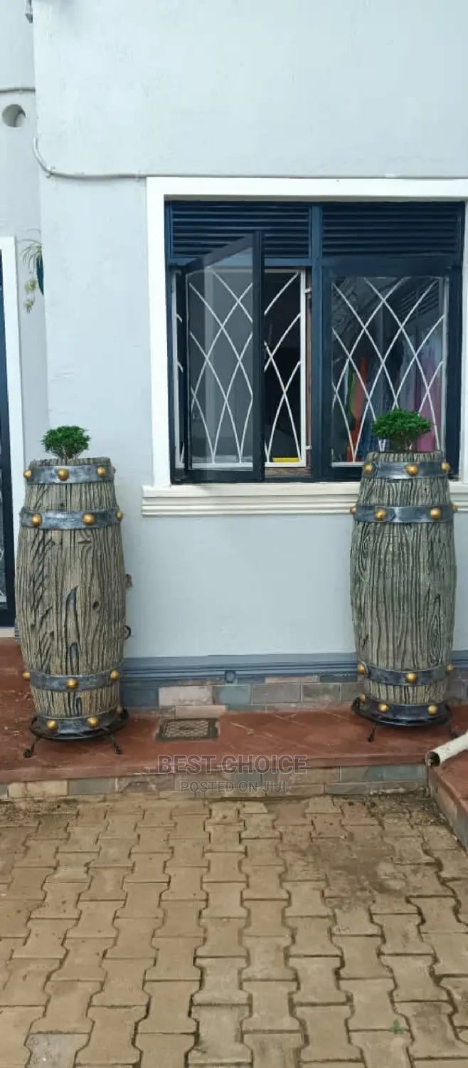 Ugandas Finest Gardeners, Compound Designers, Land Scarpers.