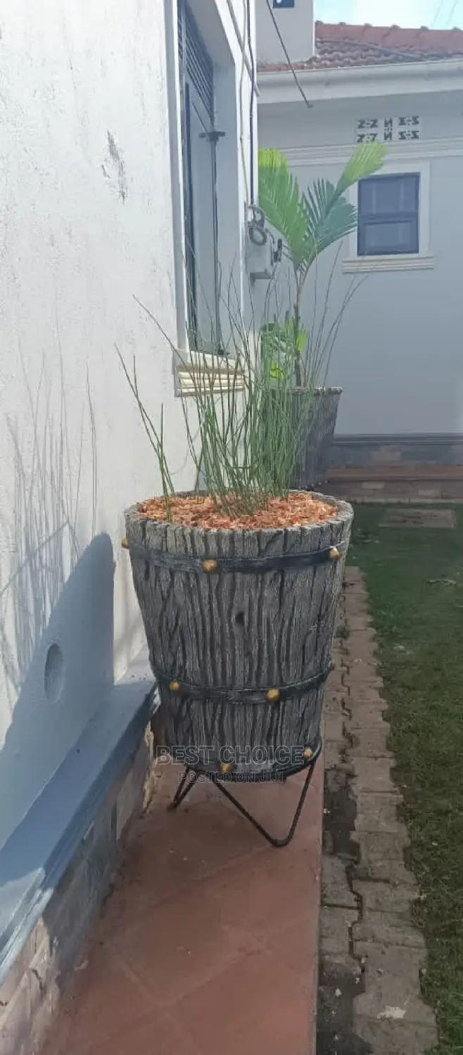Ugandas Finest Gardeners, Compound Designers, Land Scarpers.
