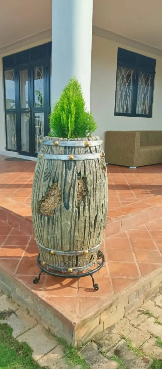 Ugandas Finest Gardeners, Compound Designers, Land Scarpers.
