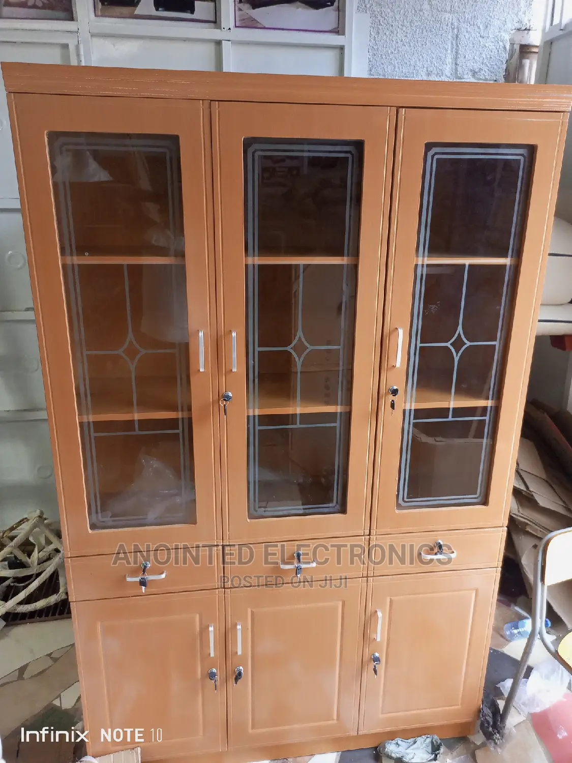 Three Doors Brown Cupboard