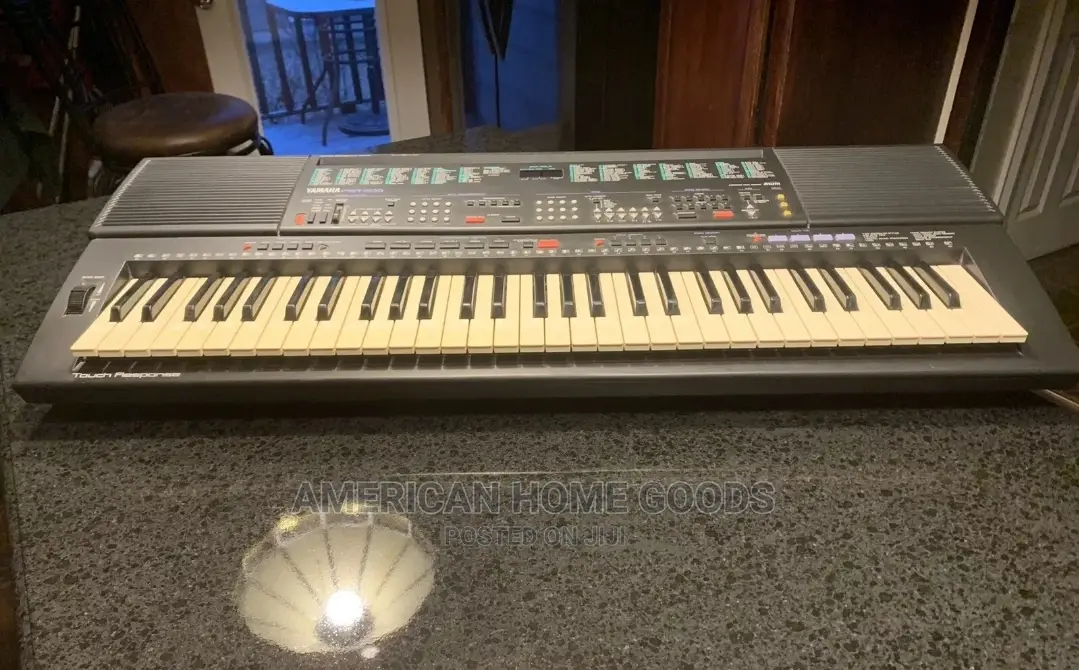 Yamaha PSR-500, 61 Keys Electronic Keyboard With Stand.