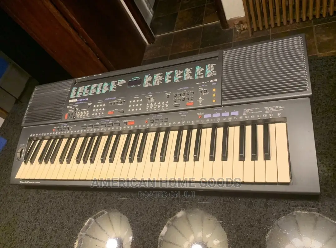 Yamaha PSR-500, 61 Keys Electronic Keyboard With Stand.