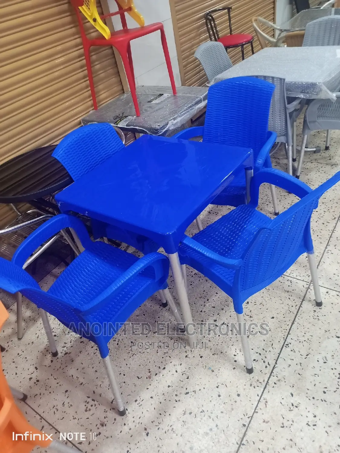 A Set Plastic Table and Chairs