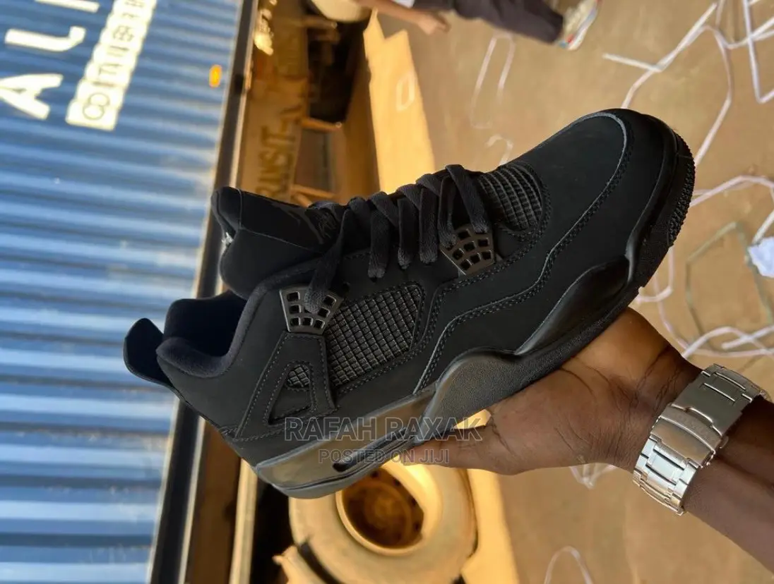 Original Triple Black Cat Air Jordan 4 Retro Sneaker