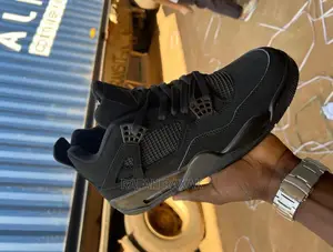 Original Triple Black Cat Air Jordan 4 Retro Sneaker