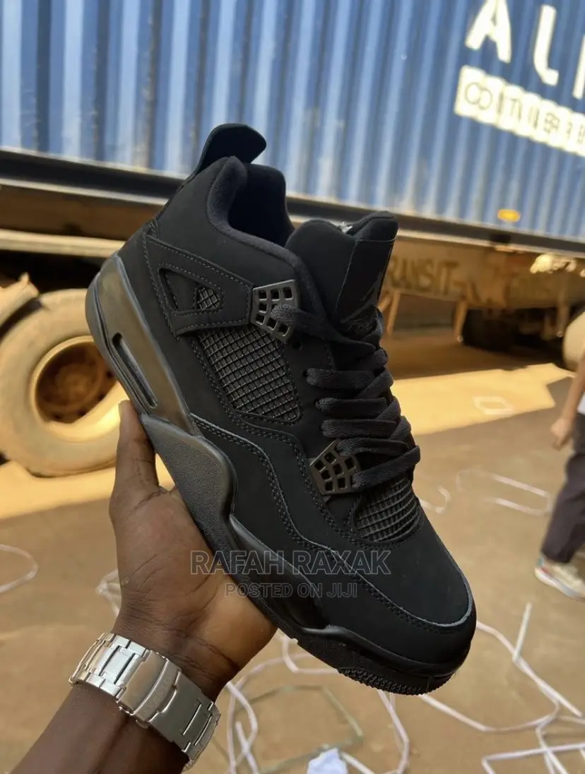 Original Triple Black Cat Air Jordan 4 Retro Sneaker